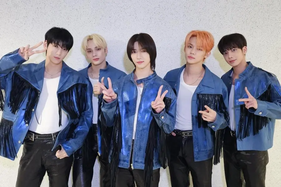 TXT. (Soompi)
